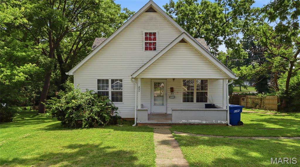 This charming one-and-a-half-story home sits on a spacious double lot at the edge of town. Inside, you'll find a comfortable living room and a cozy family room with a fireplace, along with central heating and air conditioning for year-round comfort. Outdoors, enjoy an above-ground pool with an attached deck, perfect for relaxing or entertaining.

The home also features a full unfinished walkout basement. Additional highlights include a tuck-under garage, a drive-through carport, and a Victor wood stove in the basement to help reduce heating costs during the winter. Don't miss the opportunity to see everything this property has to offer and make it your own