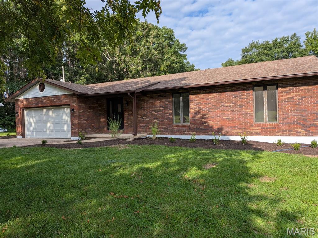 What a fabulous find!  37 pristine acres with updated 3 bedroom and 2 full baths with basement and 2 car garage and pole barn!!  And walk across the street and play golf!!  One of a kind opportunity in this area!