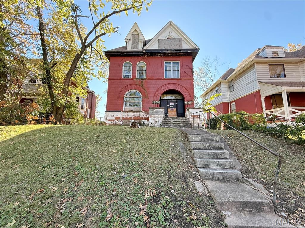HUGE historic home, 3 stories ready for your vision! Outstanding location - great block of Greers Addition, on a one way street. This home is three stories of living and has a full basement and endless potential! Large front porch, arched brick around the front door. BIG city lot 41 x 141. Sqft is more than tax records reflect, guestimate is around 2,900. Could be a great 6 bedroom home with 3 full baths and a main floor bath. Lots of historic charm - beautiful brick built, fireplaces, hardwood flooring, columns+++ Who's ready to turn this into their dream home? Savvy investors! Turn this into a great income producing rental, either short term or long term - lots of bedrooms for section 8 / AirBnb. Make a smart investment move this quarter / end of year. Excellent flip opportunity - rehab & resell! Could also be purchased with 4753 Maffitt Avenue, St Louis, Missouri 63113 as a package deal. STL City has lots of opportunities for investors - this property may qualify for credits/ benefits due to its location. Opportunity Zones are economically-distressed areas where new investments may be eligible for preferential tax treatment. CALL NOW
