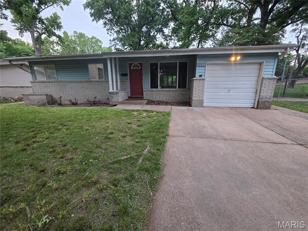 Updates since the last listing, this property will be ready to  view on 05/18/2026 . The main level welcomes you with hardwood floors throughout, flowing seamlessly from the bright living and dining areas into the functional eat-in kitchen. This floor features a convenient layout with three bedrooms and two full bathrooms, offering effortless single-level living.
The living space extends deep into the partially finished basement, a versatile area boasting a massive family room, a large laundry and utility center, and two additional bonus rooms perfect for a home office, gym, or expansive storage.
Outside, your private oasis awaits. Relax on the screened-in back porch and take in the tranquility of a lot that backs directly to woods. The entire backyard is securely fenced, providing a haven for pets or play, while the attached one-car garage adds the perfect touch of convenience.