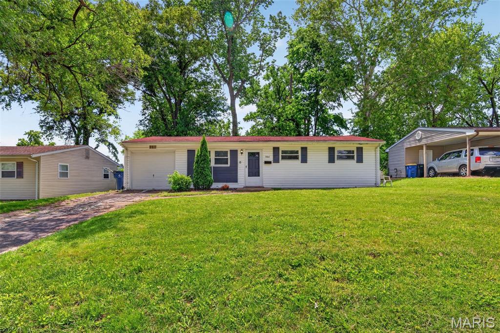 Presenting 9446 Stansberry AVE, STLS MO 63134, a single-family residence constructed in 1957, offering an inviting home environment ready for immediate occupancy. This property exemplifies a harmonious blend of classic architectural design and contemporary living. The kitchen is thoughtfully appointed, featuring a distinctive wainscot wall that adds a touch of refined character to the space. This ranch-style residence includes an attached garage, providing convenient and secure vehicle accommodation. The property offers three well-proportioned bedrooms and a full bathroom, designed for comfort and functionality. We invite you to experience the refined living offered by this exceptional property.