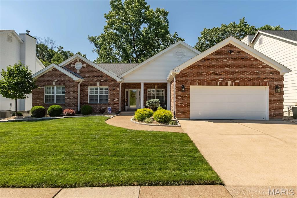 Welcome home to this beautifully maintained 5-bedroom, 3-full-bath ranch, perfectly situated in the sought-after Oak Brook Elementary school area. From the moment you step into the open foyer, you're greeted by a thoughtful layout featuring a formal dining room and a private office, each finished with plantation shutters. Gleaming hardwood floors flow throughout the main living area, adding continuity to every room. The heart of the home is the spacious kitchen and breakfast room, boasting granite countertops, a tile backsplash, stainless steel appliances, and a vaulted ceiling that fills the space with light. Sliding doors lead to a covered deck with a ceiling fan — the perfect spot to unwind while overlooking the peaceful, wooded backyard. Just beyond, the large great room impresses with a wood-burning fireplace framed by a classic brick surround, soaring vaulted ceilings, and an abundance of windows that flood the space with natural light. The primary suite offers an updated en-suite bath featuring a tiled shower, double vanity, soaking tub, and crown molding. An updated hall bath and two generously sized bedrooms complete the main level. Downstairs, the walkout lower level offers incredible flexibility with 2 additional bedrooms — each with walk-in closets — a full bath, and multiple areas ideal for entertaining or relaxing. You'll also find ample storage, including a cedar closet, and French doors that open to your own private outdoor oasis, complete with a paver patio and a porch swing — an inviting space to enjoy your morning coffee or unwind in the evening. Additional peace of mind comes with a new HVAC system (2025) and roof (2023). Ideally located near major highways, shopping, and dining, this home offers the perfect blend of comfort, functionality, and convenience. Don't miss your chance to make this exceptional home your own.