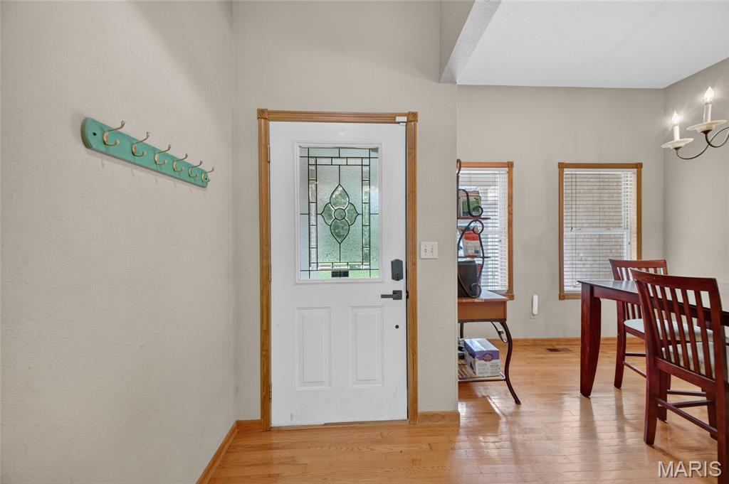 Perfectly situated on 3 picturesque, park-like acres just outside city limits, this spacious 4-bedroom, 2-bathroom home offers the rare combination of peaceful country living and a highly sought-after location. Offering the perfect balance of privacy and convenience, this property provides the peaceful country feel while remaining just minutes from local amenities. Inside, you'll find a warm and inviting layout featuring both a formal dining room for hosting family gatherings and a cozy breakfast nook for everyday meals. The thoughtfully designed floor plan offers plenty of space while still maintaining a comfortable, homey atmosphere. The garage is equipped with a mini-split system, making it ideal for a workshop, hobby space, or even a home gym. The expansive attic provides abundant storage and offers exciting potential. Gather around the inviting fire pit on cool evenings, roast marshmallows with family and friends, or simply relax while taking in the peaceful, park-like setting surrounded by mature trees. With a little TLC, this property has all the ingredients to become the forever home you've been dreaming of. Combining space, character, and an unbeatable location, this is an opportunity you won't want to miss.