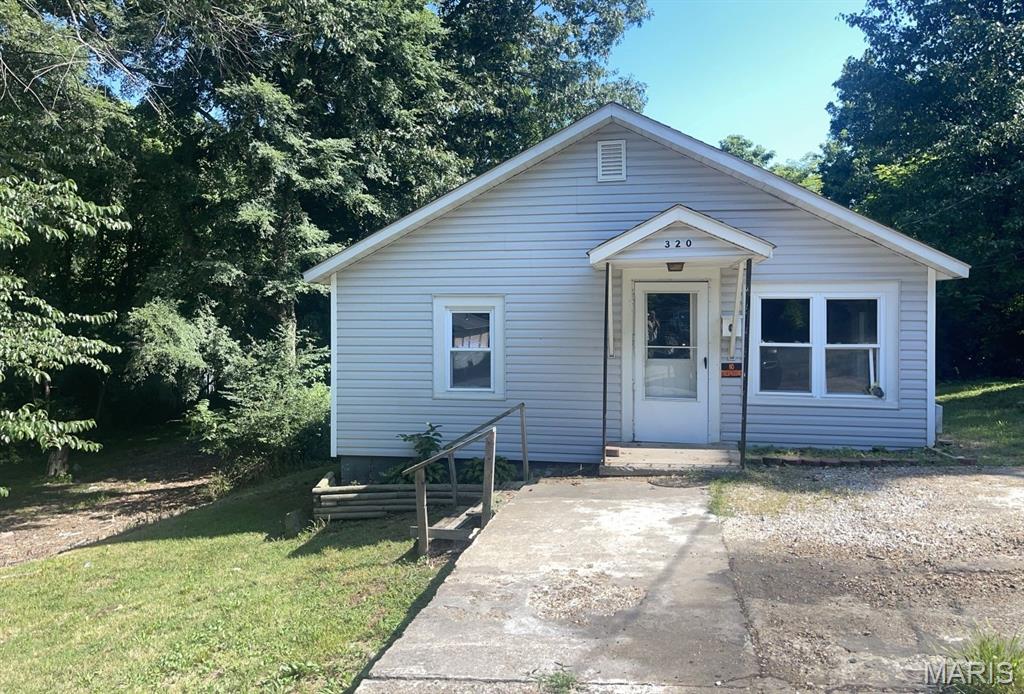 Are you wanting to find a small home for yourself or to become an investor?  Are you an Investor wanting to increase your portfolio?  Now is your chance!  This home has potential to be an investment for you to consider.  This home has had several updates but could use a bit of TLC.  A newer kitchen includes Oak cabinets, a range, a pantry, and room for a kitchen table.  It has two bedrooms, one bathroom and a larger living room area for you to relax.  Step out back to find a deck which is perfect for those bar-b-que meals.  A shed is included for your lawncare supplies.  If that isn't enough, the empty lot to the west is included!  You have two lots to give you ample parking or a place to build something else.  The property is sold As-Is, Where-Is. Seller has no knowledge; buyer should perform their due diligence and make their own assessments.