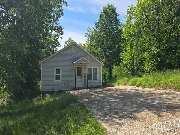 Are you wanting to find a small home for yourself or to become an investor?  Are you an Investor wanting to increase your portfolio?  Now is your chance!  This home has potential to be an investment for you to consider.  This home has had several updates but could use a bit of TLC.  A newer kitchen includes Oak cabinets, a range, a pantry, and room for a kitchen table.  It has two bedrooms, one bathroom and a larger living room area for you to relax.  Step out back to find a deck which is perfect for those bar-b-que meals.  A shed is included for your lawncare supplies.  If that isn't enough, the empty lot to the west is included!  You have two lots to give you ample parking or a place to build something else.  The property is sold As-Is, Where-Is. Seller has no knowledge; buyer should perform their due diligence and make their own assessments.