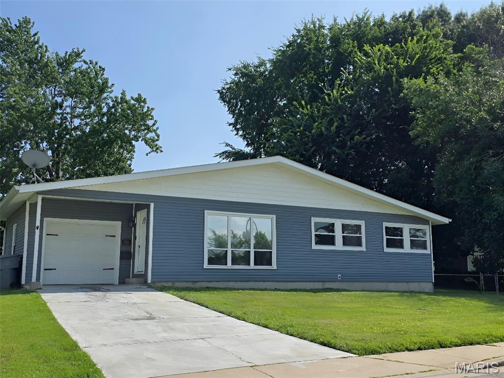Move-in ready ranch-style home with an oversized attached one-car garage, situated on a level, fenced backyard. Recent updates include fresh interior paint, new carpeting, vinyl siding, and insulated replacement windows, providing both comfort and low-maintenance living. The partially finished lower level offers flexible space ideal for a family room, home office, workout area, or recreation room. Conveniently located near shopping, dining, parks, and everyday amenities with quick access to major highways, making commuting simple. Easy to show! Set your appointment today!