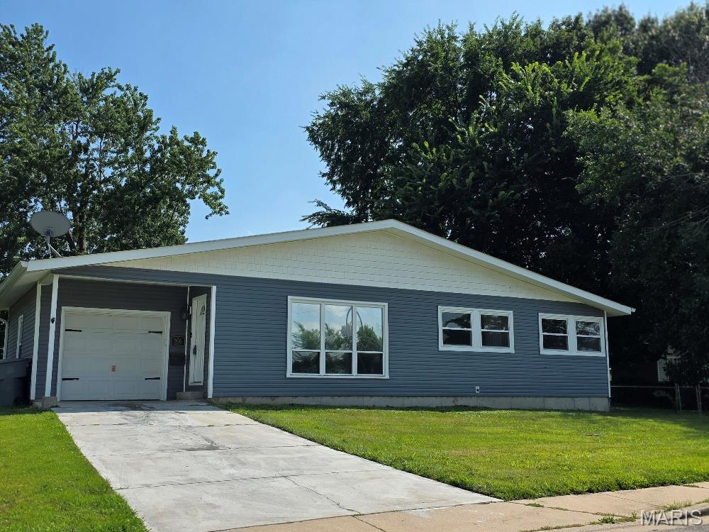 Move-in ready ranch-style home with an oversized attached one-car garage, situated on a level, fenced backyard. Recent updates include fresh interior paint, new carpeting, vinyl siding, and insulated replacement windows, providing both comfort and low-maintenance living. The partially finished lower level offers flexible space ideal for a family room, home office, workout area, or recreation room. Conveniently located near shopping, dining, parks, and everyday amenities with quick access to major highways, making commuting simple. Easy to show! Set your appointment today!