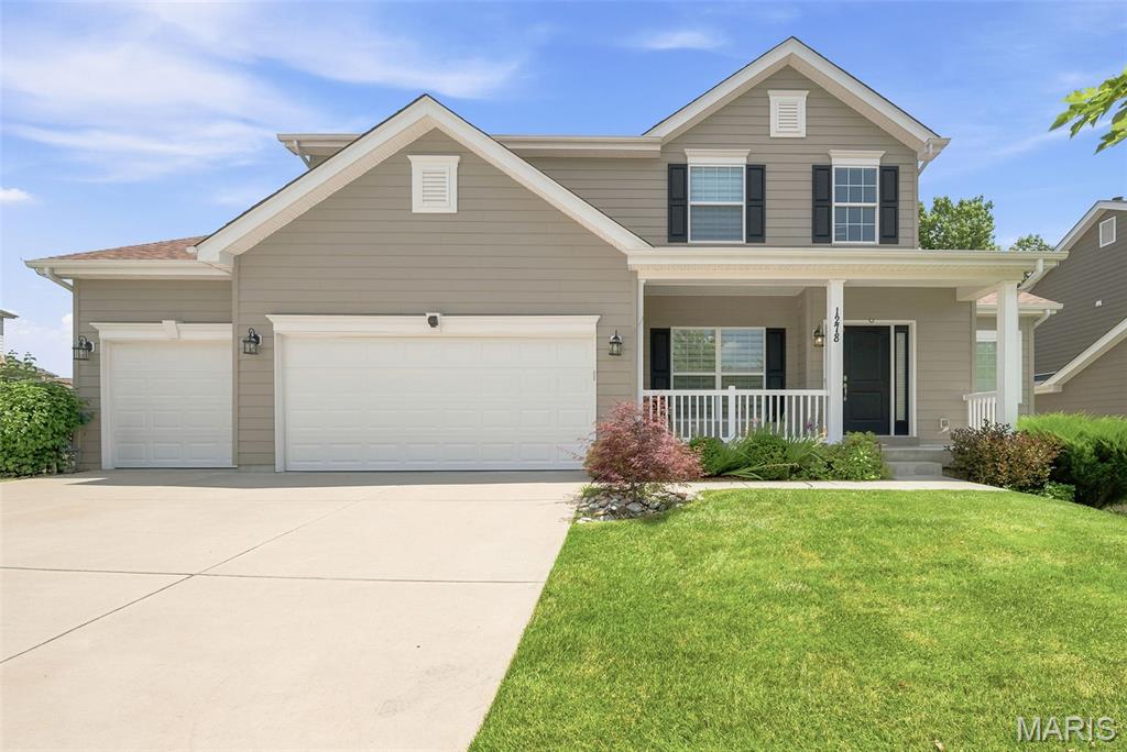 Price improved on one of Chesterfield's most impressive opportunities.
Perfectly positioned on a premium wooded lot with peaceful sunrise views, this exceptional 2020 1.5-story offers the privacy, luxury, and lifestyle today's buyers are searching for. With over 4,500 square feet of finished living space, including a beautifully finished walkout lower level, every space has been thoughtfully designed for both everyday living and effortless entertaining. A dramatic two-story great room filled with natural light anchors the open floor plan, while the chef's kitchen features quartz countertops, an expanded island, marble subway tile backsplash, under-cabinet lighting, a walk-in pantry, and upgraded cabinetry. The spacious main-floor primary suite provides a private retreat, while every detail throughout the home reflects quality craftsmanship and thoughtful upgrades. Step outside to a newer 16' x 20' composite deck overlooking wooded common ground, then continue to the professionally designed outdoor living space featuring a flagstone patio, retaining wall seating, decorative lighting, landscape lighting, irrigation system, and a fully fenced backyard. The walkout lower level adds approximately 1,400 square feet of exceptional living space, complete with a custom wine cellar, hot stone steam sauna, projector and surround sound wiring, expansive recreation room, full bath, and private guest suite with a walk-in closet. Additional upgrades include custom closet systems, crown molding, Tesla EV charger, WiFi-enabled garage door opener, and a new roof installed in December 2025, allowing you to move in with confidence. Beyond the home, Fienup Farms offers a lifestyle few communities can match, with a private 26-acre lake, pickleball courts, playgrounds, walking trails, and beautifully maintained green spaces. Located in the award-winning Rockwood School District and just minutes from Chesterfield Valley, Highway 40/64, restaurants, shopping, and the future downtown Chesterfield, this home delivers the perfect balance of luxury, convenience, and everyday comfort. Homes with this combination of privacy, upgrades, outdoor living, and location rarely become available. Now offered at a new price, this is an opportunity you won't want to miss.