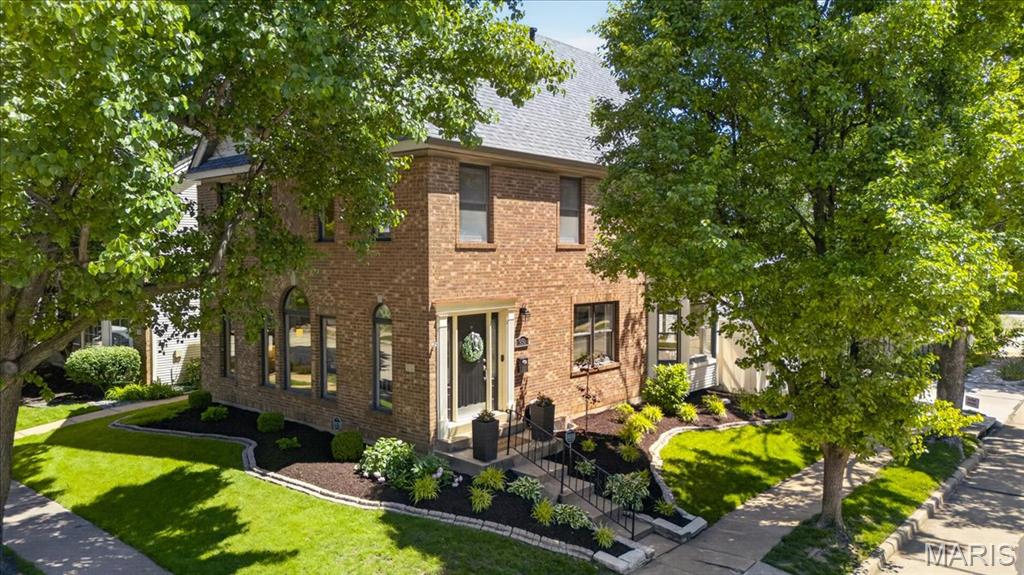 Experience the perfect blend of sophistication and comfort in this sun-drenched, 5-bedroom, 3.5 bath home located in the highly coveted University Place. The main level impresses with a soaring great room anchored by a gas fireplace and a designer kitchen featuring quartz countertops, a wine refrigerator, and high-end appliances. From the raised dining room to the charming breakfast nook with its cozy bay window seating, every space is designed for effortless entertaining. Upstairs, the primary suite offers a spa-like retreat with dual vanities and a walk-in closet organizer, while the third floor provides two additional bedrooms and a full bath—perfect for a quiet home office or guest wing. The expansive finished lower level adds even more versatility, providing the ideal footprint for a private media room, home gym, or recreation space to suit your lifestyle. Beyond its interior beauty, this home provides ultimate peace of mind with an extensive list of recent upgrades. Recent improvements include a new roof (2025), new gutters and fascia (2026), a radon mitigation system, and an advanced Air Scrubber purifier. With a complete landscaping overhaul featuring fresh sod, this move-in-ready gem offers modern luxury in an unbeatable location. Complete with a 2-car garage and a fenced yard and patio, this is the turnkey opportunity you’ve been waiting for. Schedule your private tour today!