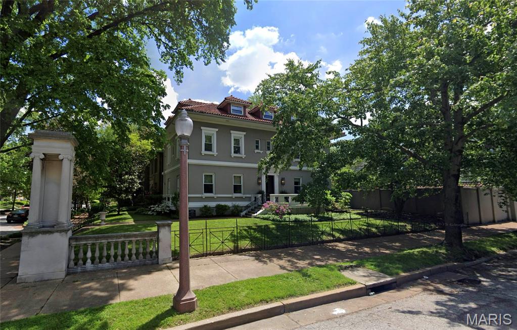Circa 1909: Proudly situated at the entrance of Fullerton's Westminster Place sits 4484 Westminster Place. Designed by George W. Hellmuth, this historic manse features just over 6000 sq/ft, 5+ bedrooms, 3.5 bathrooms, gorgeous originals details, thoughtful updates & designer finishes throughout. The gracious & elegant formal living & dining rooms, with stunning pocket-doors, beautiful millwork, stained glass windows, leaded-glass built-ins & gas-burning fireplaces, are perfect for entertaining. The updated chef’s kitchen includes custom cabinets, custom zillege tile backsplash, granite countertops, SS appliances with a center island & butler’s pantry with beverage fridge & built-in ice maker. Upstairs, off the generously sized primary bedroom, you will find a private bath with spa-like multi-head shower, custom roman travertine tile & radiant-heated floors & a spacious walk-in closet with custom NewSpace cabinetry. Rounding out the 2nd floor are two spacious guest bedrooms with a jack & jill bathroom, office & laundry with high efficiency combo washer/dryer & custom applied paneling & storage. The 3rd floor, with beautiful original wood floors, offers a fantastic billiard/TV/game room, two guest bedrooms, full bath with laundry & eat-in kitchen. (That or easily convert the 3rd floor into a rentable apartment.) Outback, enjoy summer entertaining on the spacious patio and relax by the in-ground Pebble-Tec pool with heater. Oversized 2-car garage with EV charger. Walking distance to neighborhood shops, cafes & restaurants, beloved Forest Park, Wash U & more!