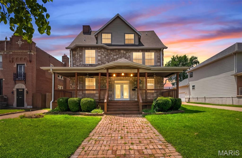 Welcome to 5830 Clemens Ave. This stunning updated 5 bedroom, 3.5 bath two-story home offers luxury finishes, two primary suites, and exceptional curb appeal.
Boasting a striking stone façade, covered front porch, and elegant brick walkway, the home welcomes you with classic charm and modern sophistication. Inside, the bright open concept main level features soaring ceilings, abundant natural light, and gleaming floors. The gourmet chef’s kitchen is a true highlight, equipped with premium finishes including two ranges, two dishwashers, two prep sinks, a large granite island, rich wood cabinetry, and a built-in stone gas grill.
Spacious living areas flow beautifully throughout. Upstairs, you’ll find two luxurious primary suites, each with spa-like en-suite baths offering jetted tubs, separate showers, double vanities, and high-end finishes. Three additional bedrooms and a half bath provide excellent flexibility for family or guests.
Step outside to enjoy the huge wooden deck and large fenced backyard with mature trees, the perfect private oasis for entertaining or relaxation. The clean unfinished basement with high ceilings offers great potential for future expansion or storage. Offstreet parking ;fits 2 cars.
Loaded with luxury finishes and thoughtful upgrades, this move-in ready home is nestled in a convenient, established neighborhood. Don’t miss this rare opportunity!