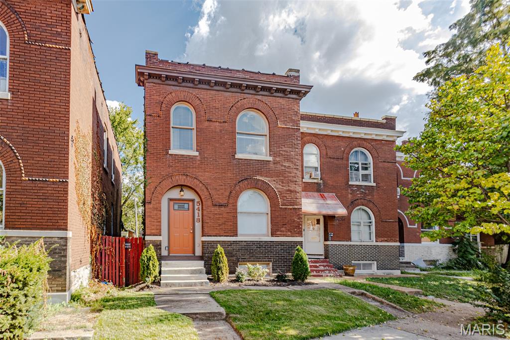 Beautifully renovated turnkey 3-bedroom, 2-bath brick home in desirable South City! Conveniently located near highways, shopping, dining, and neighborhood amenities, this charming two-story blends historic character with modern style. The open-concept main level features spacious living and dining areas flowing into a stunning kitchen with stainless steel appliances, white cabinetry, mosaic tile backsplash, and a large center island with breakfast bar seating—perfect for entertaining. Dual staircases offer convenient front and kitchen access between levels. Upstairs, you’ll find three spacious bedrooms filled with natural light and updated baths with contemporary finishes. Enjoy the newly fenced backyard with parking pad and space to relax or entertain. Classic brick curb appeal, thoughtful updates throughout, and St. Louis City occupancy already passed make this move-in-ready home a must-see!