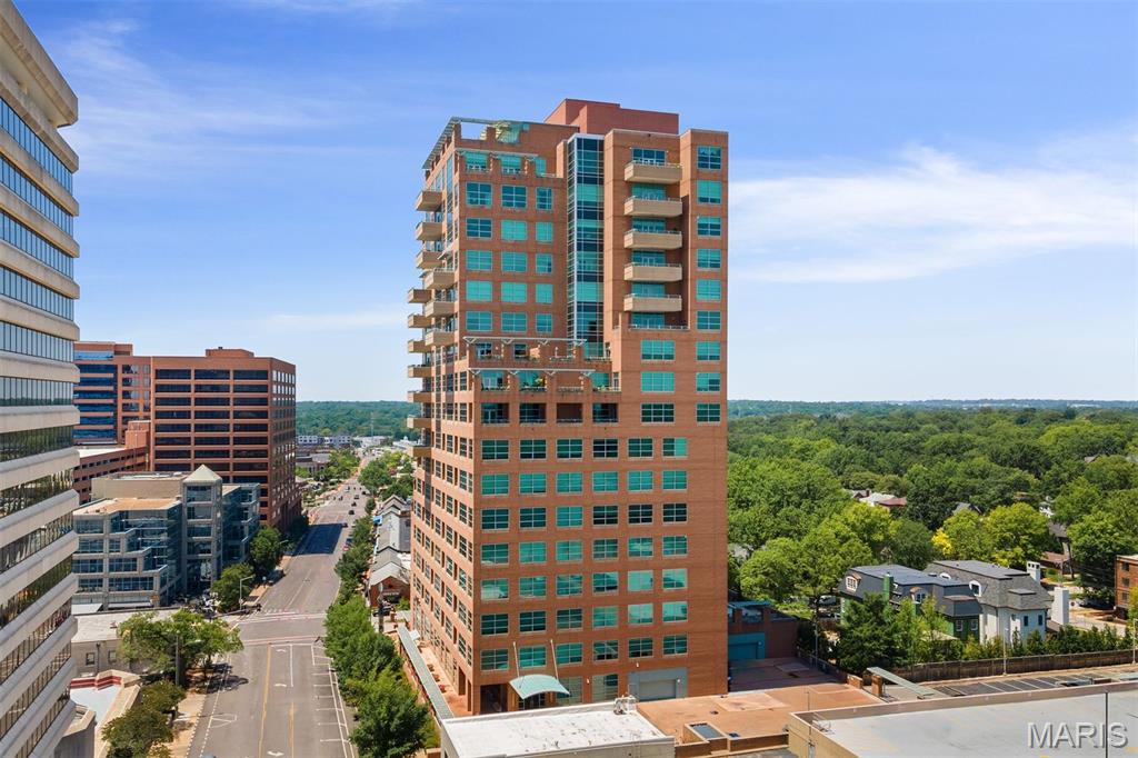 Don't miss this rare opportunity to live in Clayton's Premier Condo Community of Maryland Walk. This vertical and urban lifestyle offers a couple amenities that are rarely offered - an extra office space and windows in every room, no I'm not kidding! This space commands a few special features - sought after two directional views of the StL City skyline to the east and Clayton Gardens to the north, a walk up bar for entertaining and a large laundry closet with full-size washer and dryer located away from the kitchen area unlike others in the community.