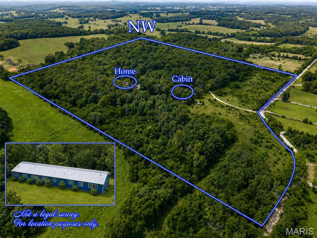41+ acres with 6 bedrooms and 3 baths. It has 2 kitchens, 2 living rooms, 2 dining rooms, and 2 washer hookups. This home was set up as a duplex; it could be converted back to 2 families. It has heated concrete floors throughout, has central heat and air, and a ventless backup. Shop is 30x16. Plus the shed. The shop has a vent for a wood stove. The cabin is a one-bedroom and could be rented out. It's secluded and sits back off the road with lots of privacy, lots of wildlife, and close to the lakes and rivers. Creek runs most of the time, one pond in the front.