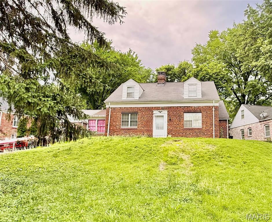 Spacious 1.5 story home in amazing neighborhood. Classic Cape Cod design maintenance free brick exterior on a wonderfully private lot. Some New paint, and tons of beautifully refinished hardwood floors. New sewer line in was installed in front yard. need 24 notice to view then lockbox.