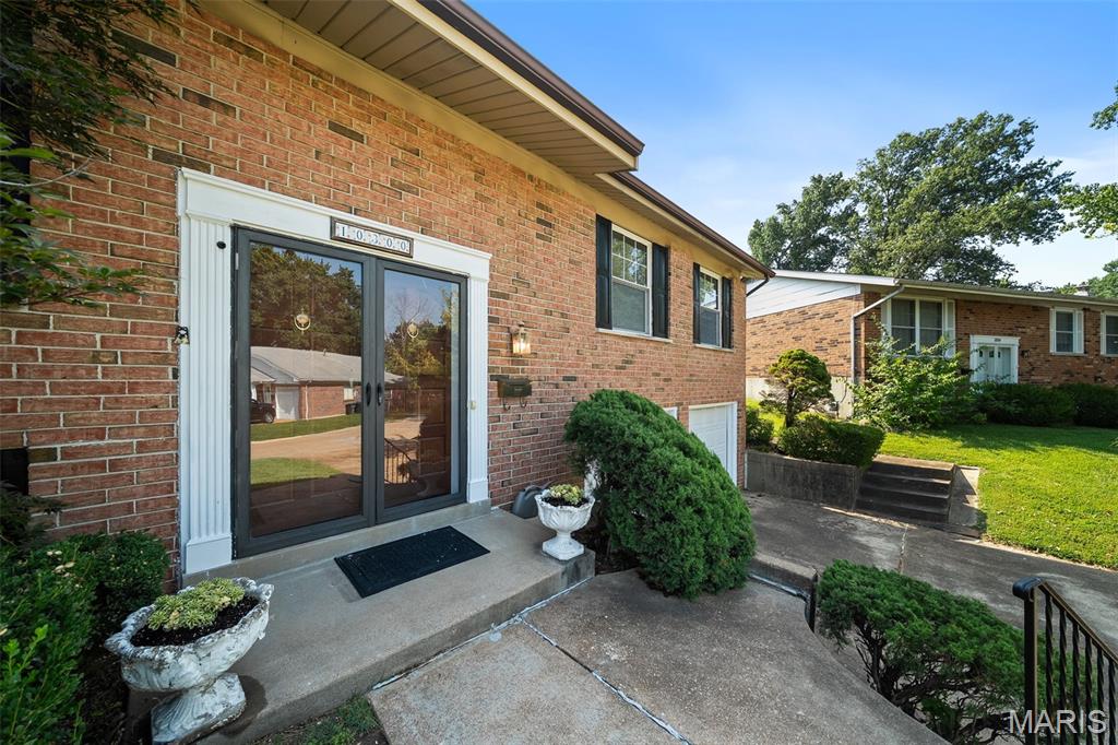 Welcome to this one-owner home in the award-winning Lindbergh School District, where pride of ownership shines throughout. A rare addition sets this home apart, creating an expansive kitchen and hearth room that's perfect for everyday living and entertaining. This beautiful space features a soaring cathedral ceiling, skylights that fill the room with natural light, a cozy wood-burning fireplace, granite countertops, and a large center island that naturally becomes the heart of the home. 3 Bedrooms and 2 full baths finish out the main level. Primary bedroom boasts double closets. You'll find even more space to spread out in the lower level which includes a half bath.  Step outside to enjoy the spacious, fully fenced backyard complete with a deck—ideal for relaxing, grilling, or entertaining. Other features to note include a newer roof (2022) and oversized garage with storage closet . Ideally located just minutes from Grant's Trail, the Affton Athletic Association, shopping and dining, this home offers the perfect blend of space, style, and location.
