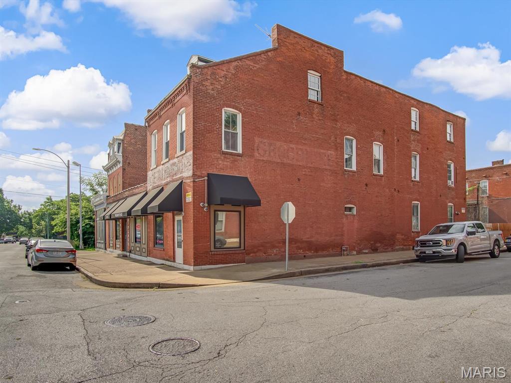 Step into a unique opportunity to own a piece of local history with this impressive 6,156 sq. ft. commercial property full of character and potential. Previously operating as Trueman's Place, the main floor offers a fully furnished bar area, a commercial kitchen, flexible dining or event space, and two private office areas in the rear of the building. Outside, a large patio overlooks a former volleyball court, creating endless possibilities for outdoor dining, live entertainment, or special events.

The upper level features a spacious 1-bed, 1-bath apartment complete with a loft, bonus room, comfortable living area, and an eat-in kitchen. The loft could easily be reimagined as a second bedroom if desired. Convenient street parking is available for guests and patrons. Whether you envision reopening it as a restaurant, transforming it into the newest Benton Park gathering spot, or creating a new entertainment destination, this iconic property is ready for its next owner to bring their vision to life.