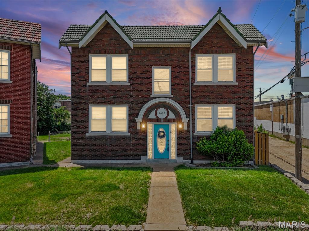 Available for the first time since the 1990s, this one-of-a-kind former 4-family building—now configured as a triplex—offers a rare opportunity for both investors and owner-occupants. Live in the spacious vacant 2-bedroom townhouse-style unit while generating $1,650 per month in rental income from the two occupied 1-bedroom units, currently leased at $800 and $850 per month (both below market rates).

The property's standout feature is its incredible outdoor space. The townhouse unit enjoys direct access to a large elevated deck overlooking an exceptionally deep, beautifully landscaped, fully fenced yard—an uncommon find in the city. The deck also serves as a covered carport for up to three vehicles, with an additional three off-street parking spaces on the concrete pad below. A motorized gate with heated back-up battery provides secure access to the parking area. Major updates include all three HVAC systems replaced in 2020, water heaters installed in 2021 and 2024, and a TPO roof in 2018. Additional amenities include two secure storage rooms and coin-operated laundry in the basement. The lawn irrigation system is currently not in use and will convey as-is. Ideally located within walking distance of MOBOT, Tower Grove Park, and Comet Coffee, this property combines strong income potential with an exceptional lifestyle. With its unique configuration, expansive lot, extensive parking, valuable updates, and premier location, opportunities like this are exceptionally rare. See the vacant unit today; the 2 one bedroom units will be shown with an accepted contract. Seller prefers an as-is sale.