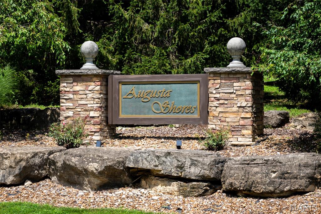 4397 Augusta Shores Dr — Build Your Dream Home on 3.370 Private Acres

Discover one of the largest and most private homesites available in Augusta Shores — a sprawling 3.370-acre wooded lot offering space, seclusion, and endless possibility for your custom dream home. With generous, irregular dimensions (400' x 64' x 63' x 197' x 39'), this parcel offers a variety of potential building sites and plenty of room to design a home, outbuildings, or outdoor living space that truly stands apart. The sellers had a floor plan drawn up for this lot and will share it with the buyer — a great head start for anyone ready to bring their dream home to life.

Nestled in the heart of Missouri's Wine Country, Augusta Shores is a gated, amenity-rich community perched along the bluffs of the Missouri River and bordered by Katy Trail State Park. Enjoy access to four spring-fed, stocked fishing lakes, a community pool, clubhouse, pavilion, and tennis/pickleball courts — all within 233 acres of common ground featuring private roads, streetlights, and underground utilities.

Bike the Katy Trail along the community's eastern border, hike the trails of Klondike Park just across Hwy 94, cast a line in one of the neighborhood lakes, or simply enjoy the wildlife and wooded privacy right from your own backyard. You're just minutes from area wineries, local favorites like Sunflower Hills, and only 15 minutes to Hwy 40/61 for an easy commute.

Utilities include public water, public sewer, electric, and 5G fiber optic internet — all available at the lot line. There's no time limit to build, so bring your own builder or ask the listing agent about trusted builders in the community.

With over 3 acres of privacy and room to breathe, this is a rare chance to build the home you've always wanted in one of the region's most desirable gated communities.