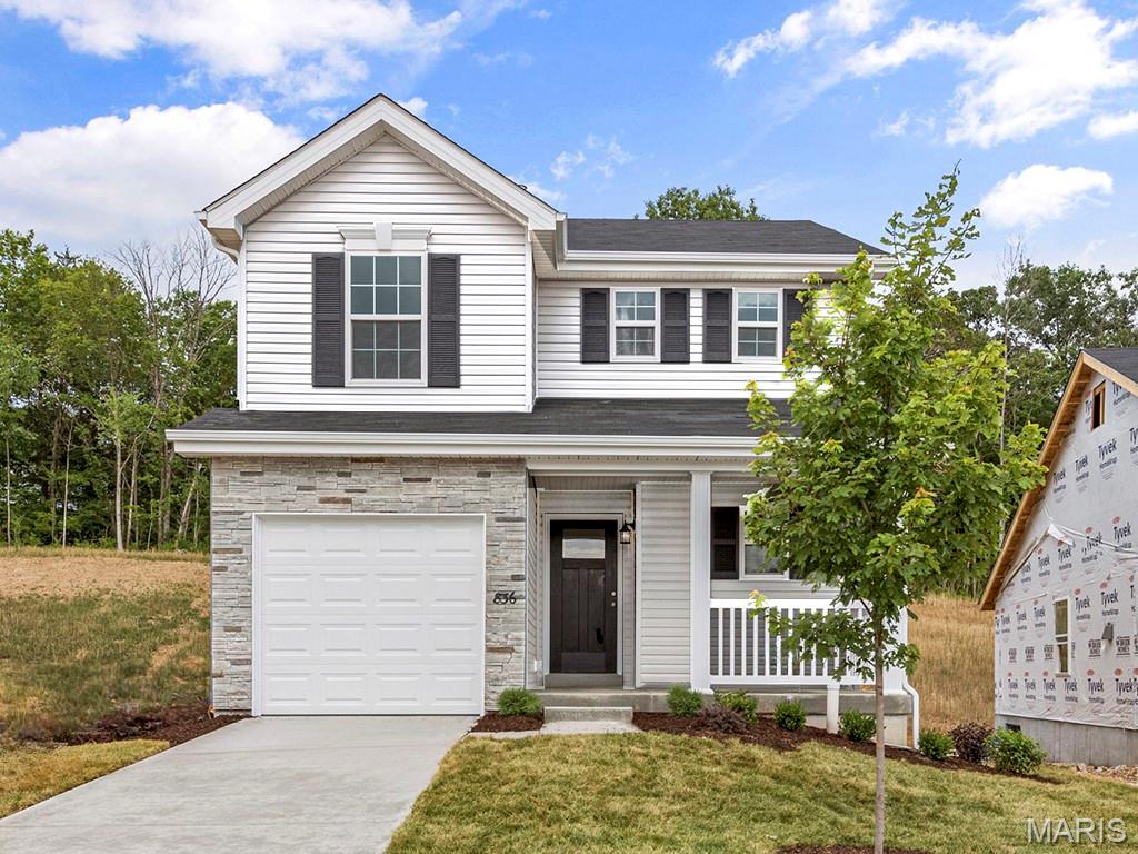 New McBride Homes Royal II 2-story 4BR 2.5BA will be move in ready this fall! Farmhouse exterior & walkout homesite! Enjoy an open floorplan w/ 6ft windows & wood laminate flooring. The luxury kitchen w/center island & breakfast bar, level 4 Brellin White 42” cabinets, quartz countertops, walkin pantry, & stainless steel GE appliances. Large breakfast room w/sliding glass doors to backyard. Family room w/window wall for natural light. Formal dining room, powder room & laundry complete the main level. Upstairs the primary suite w/ large walkin closet & private luxury bath w/double bowl vanity, tub w/window, enclosed toilet, & 5’ walkin shower. 3 additional bedrooms & full hall bath add convenience. The LL includes ¾ bath rough-in for future finish.  Westhaven is included in the Wentzville School District & is located off Peine Road, with easy access to both Hwy 40 & I-70. Enjoy peace of mind w/McBride Homes’ 10-year builders warranty & incredible customer service! Similar photos shown.
