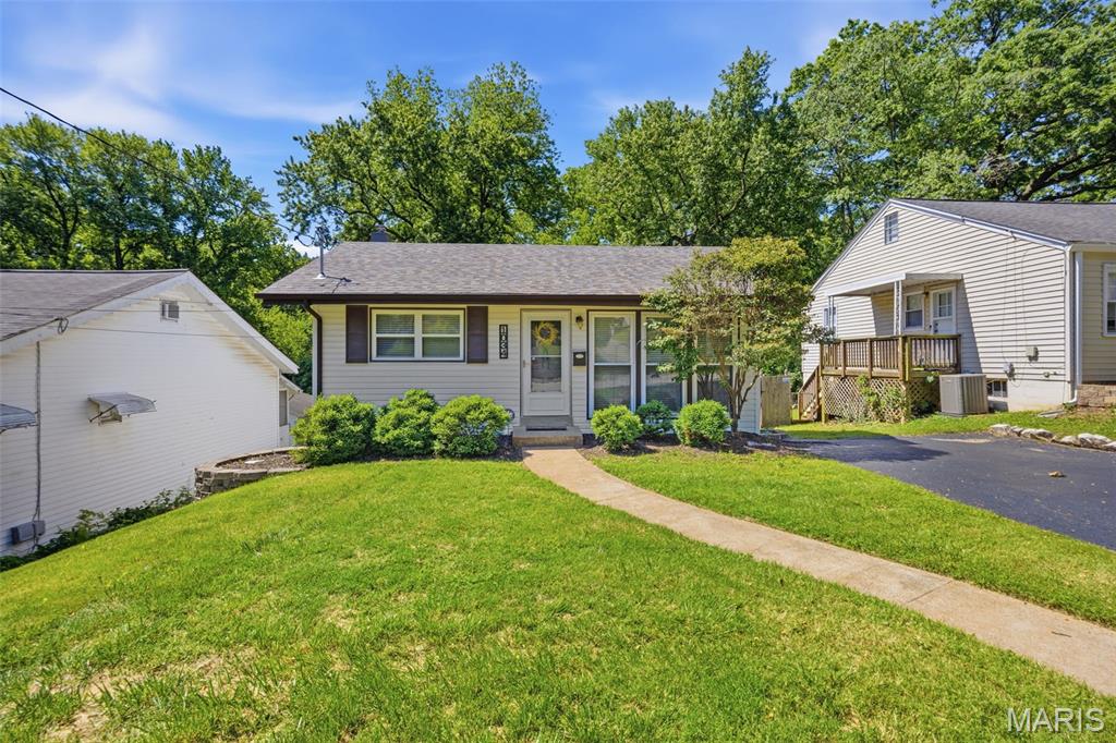 Welcome home to this absolutely charming Webster gem loaded with updates and packed with character! From the moment you arrive, you’ll fall in love with the warm hardwood floors, inviting spaces, additional living space in the basement and unbeatable location in the heart of Webster Groves. This move-in ready beauty features major recent upgrades for peace of mind, including a NEW roof (2025), NEW HVAC system (2023), NEW 200 amp electrical panel & service (2024), and NEW water heater (2024). Newer windows throughout provide energy efficiency and natural light galore! Seller also providing 1 year AHS Home warranty! Step outside and enjoy the expansive newer deck overlooking the large fenced backyard — the perfect setting for entertaining, summer BBQs, pets, playtime, or simply relaxing outdoors. Located just minutes from shopping, restaurants, parks, and everything Webster has to offer, this home combines timeless charm with modern convenience. Situated in the AAA Webster School District with award-winning elementary schools, this is an opportunity you do not want to miss! Priced to sell and ready for its next lucky owner — bring your offers before this Webster charmer is gone!