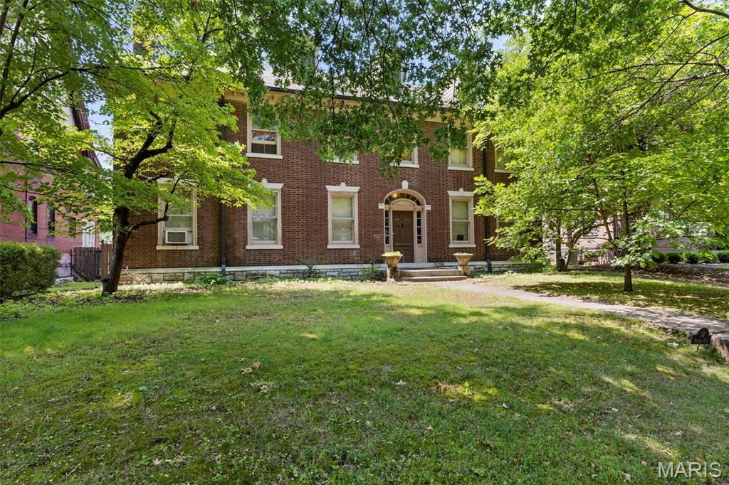 Experience the perfect blend of historic grandeur and modern convenience in this magnificent two and a half story home.  Situated in a coveted historical district, this residence boasts 13 spacious rooms, offering an abundance of living space and architectural character. The main level welcomes you with soaring high ceilings, and a traditional floor plan featuring a formal parlor, a gracious living room, and elegant dining room perfect for hosting large gatherings. Relax in the inviting sunroom, which transitions to a large outdoor patio ideal for entertaining.  Enjoy peace of mind with updated electrical system, and zoned heating and cooling servicing for the 1st and 2nd floors.  The property includes a large, oversized garage with a full 2nd floor, offering incredible potential for a carriage house, workshop, studio or additional storage. This is a rare opportunity to own a piece of history with the mechanical updates in place.  Owner if offering a $50,000.00 concession for additional improvements or price reduction. Schedule your private showing today.