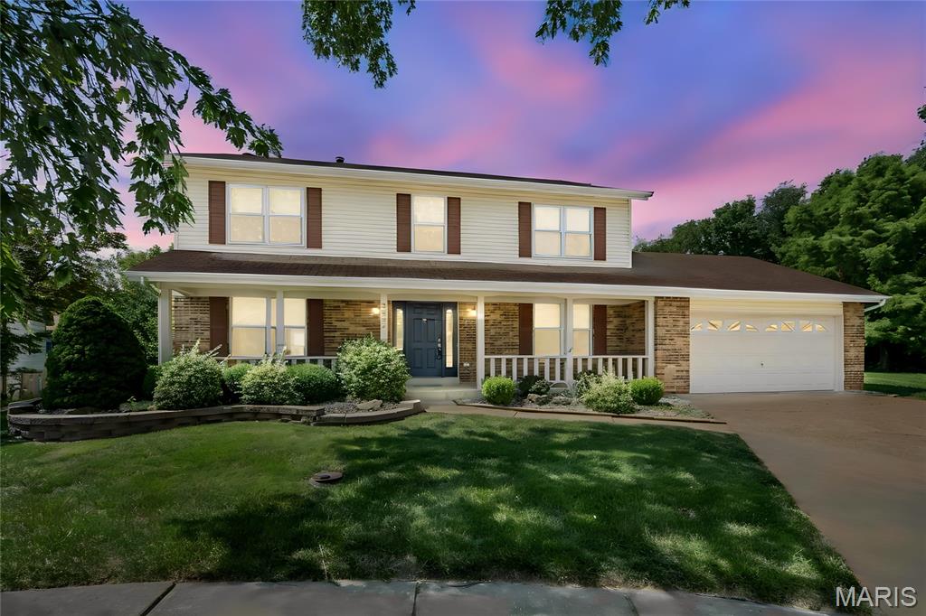 Beautifully refreshed 2-story situated on a premium level lot at the end of a quiet cul-de-sac with partial fencing and great curb appeal! From the charming covered front porch with a freshly painted front door and new lighting to the newer vinyl siding, this home has been lovingly updated inside and out. Every room, door, and trim has been freshly painted, creating a clean, modern feel throughout, and all window shades have been replaced. New modern lighting and ceiling fans. All new switch and outlet covers. New smart thermostat. Water heater 2020. 

The spacious kitchen opens to the great room and features freshly painted cabinetry w/ new hardware, new countertops, sink, faucet, lighting, newer cooktop, double oven and window. Plenty of space to entertain with a breakfast bar and breakfast room. Just beyond they added on a cute three-season room, providing additional space to relax or entertain. The formal dining room showcases a stylish new modern chandelier, while the great room offers beautiful hardwood floors, a gas fireplace, and a new ceiling fan.

A versatile front room has been thoughtfully modified to include convenient main-floor laundry, while additional laundry hookups remain available in the lower level. Convenient main floor half bath.

Upstairs you'll find new carpet, ceiling fans, lighting, and shades, fresh paint, walk-in closets in three bedrooms, and double closets in the 4th. The spacious primary suite includes a large organized walk-in closet and an attractive updated bath featuring a custom vanity, separate tub, and shower.

The unfinished lower level offers excellent storage or future finishing potential with a rough-in bath, sump pump, and approximately 6-year-old water heater. Situated on a level lot with partial fencing and a two-car garage, this move-in ready home is conveniently located near shopping, restaurants, schools, and beautiful Sunset Park, offering a wonderful combination of space, updates, and location.