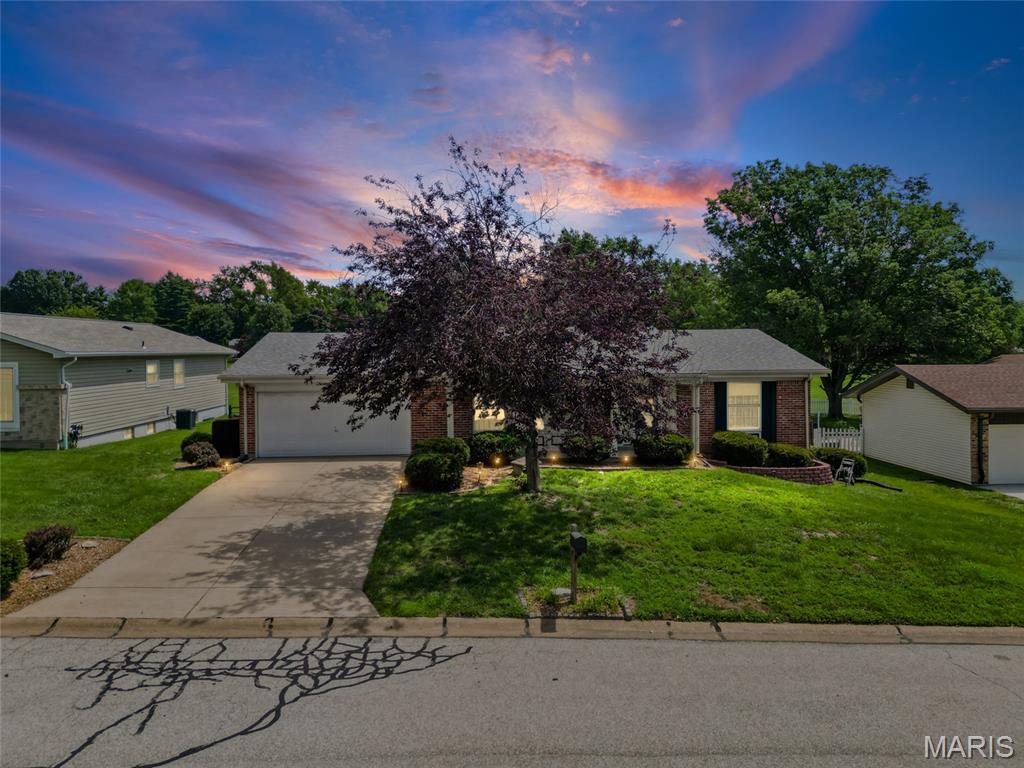 This charming residence in the Francis Howell SD that perfectly balances updates with the opportunity to add your own personal touch. Step inside to find a thoughtful layout featuring a mix of classic hardwoods and carpeting. The heart of the home is the updated kitchen, boasting updated cabinetry and countertops, complemented by a pantry for all your storage needs.

The living room has a classic gas fireplace—perfect for chilly evenings. Practicality is a priority here, with main-floor laundry and a spacious two-car garage. Major updates provide including a roof that’s only 5 years old and a newer furnace. Plus, the refrigerator, washer, and dryer are all included, making your move that much easier.

One of the standout features is the large deck, which offers a peaceful view of the lush common ground behind the property. It’s an ideal setting for morning coffee or evening sunsets. Downstairs, the full unfinished basement is a blank canvas waiting for your vision—whether you need a home gym, a workshop, or massive storage space. With some fresh paint already in place, this home is ready to shine. Bring your creative ideas and make this space truly yours!
