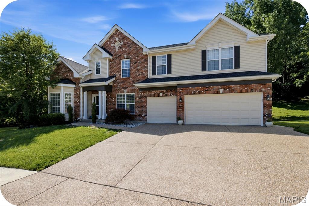 Open House Sunday 7/12 1-3pm.  Welcome home to this stunning 4 bedroom 4.5 bath in the highly sought after Hawkins Meadow area of Fenton!  High quality finishes throughout with arched entryways, crown molding, and tall ceilings that blend seamlessly with spacious and natural light filled rooms.  On the main floor you'll find a thoughtfully planned design.  Home office with charming bay window, formal dinning room for hosting holidays in style,  large living room with stone bookshelves that opens up to a home cook's dream kitchen with granite counter tops, large island, maple cabinetry, walk-in pantry, and newer appliances.  Don't forget about a half bath, wet bar, laundry room, and mud room off the attached 3 car garage for added convenience.  Upstairs you'll find the charm and thoughtfulness continues.  A cozy living area welcomes you at the top of the stairs and connects the 4 bedrooms and 3 full baths.  Two spacious bedrooms share a Jack & Jill bathroom while a third bedroom sits across the hall from an additional full bath.  The impressive primary suite is designed with comfort in mind, featuring not one, but two walk-in closets and a spa-inspired en suite bathroom complete with a walk-in shower and a jetted soaking tub.  But wait . . . there's more!  The finished basement includes an office, a multi use room, a full bathroom, and a wet bar.   And let's step outside to your own backyard retreat, where a beautiful multi-level stone patio provides the perfect setting for entertaining or relaxing and unwinding in the hot tub.  Yard is fully fenced let your furry friends explore as well.  Lots of work put in to this stunner.  New drive way in 2025, new hardwoods on the main floor in 2026, and new roof in 2021.   Zoned HVAC includes a newer 2023 system.