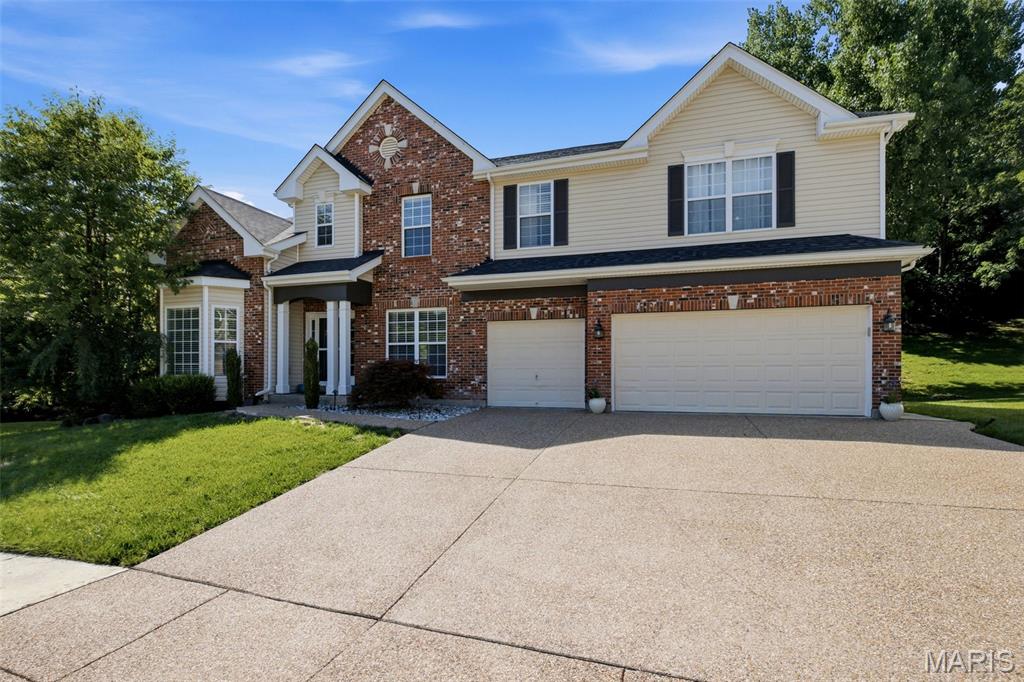 Open House Sunday 7/12 1-3pm.  Welcome home to this stunning 4 bedroom 4.5 bath in the highly sought after Hawkins Meadow area of Fenton!  High quality finishes throughout with arched entryways, crown molding, and tall ceilings that blend seamlessly with spacious and natural light filled rooms.  On the main floor you'll find a thoughtfully planned design.  Home office with charming bay window, formal dinning room for hosting holidays in style,  large living room with stone bookshelves that opens up to a home cook's dream kitchen with granite counter tops, large island, maple cabinetry, walk-in pantry, and newer appliances.  Don't forget about a half bath, wet bar, laundry room, and mud room off the attached 3 car garage for added convenience.  Upstairs you'll find the charm and thoughtfulness continues.  A cozy living area welcomes you at the top of the stairs and connects the 4 bedrooms and 3 full baths.  Two spacious bedrooms share a Jack & Jill bathroom while a third bedroom sits across the hall from an additional full bath.  The impressive primary suite is designed with comfort in mind, featuring not one, but two walk-in closets and a spa-inspired en suite bathroom complete with a walk-in shower and a jetted soaking tub.  But wait . . . there's more!  The finished basement includes an office, a multi use room, a full bathroom, and a wet bar.   And let's step outside to your own backyard retreat, where a beautiful multi-level stone patio provides the perfect setting for entertaining or relaxing and unwinding in the hot tub.  Yard is fully fenced let your furry friends explore as well.  Lots of work put in to this stunner.  New drive way in 2025, new hardwoods on the main floor in 2026, and new roof in 2021.   Zoned HVAC includes a newer 2023 system.