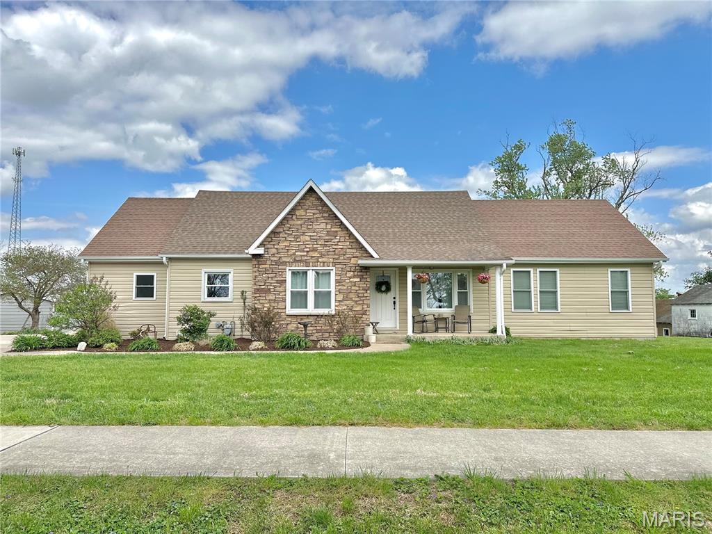 This beautifully designed 1.5-story home offers the perfect blend of comfort, functionality, and modern living. Featuring four spacious bedrooms and two full bathrooms, the layout is thoughtfully crafted to accommodate both everyday living and entertaining.  The main level boasts a bright, open-concept design that seamlessly connects the kitchen, dining area, and living room—creating a welcoming space ideal for gatherings. The kitchen is equipped with a generous walk-in pantry, providing ample storage and convenience. Just off the main living area, a large laundry/mudroom adds practicality and organization to your daily routine.  The private master suite on the main floor serves as a relaxing retreat, complete with an ensuite bathroom and a spacious walk-in closet.  Upstairs, you’ll find a versatile and inviting space perfect for both work and play. This level includes an additional bedroom, a dedicated office, and a large family room designed for entertaining or relaxing. A designated play area makes it ideal for kids, creating a space where the whole family can unwind and enjoy.  With its smart layout and thoughtful features, this home offers the perfect balance of style, space, and functionality for modern living.