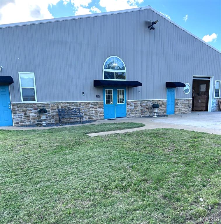 1841 Denmark Rd. presents an excellent owner-user or investment opportunity in one of the area’s fastest-growing commercial corridors. Currently utilized as warehouse space, the property is ideally located just 3 miles from the Highway 44 and Highway 50 interchange, offering convenient regional access and strong visibility within a rapidly expanding market. Surrounding development includes hundreds of new residential homes along with ongoing retail and commercial growth, making this an ideal time to secure property ownership rather than continue leasing.
The building offers approximately 2,800 square feet with 14-foot ceilings and a large overhead drive-in door designed for efficient access for trucks, vans, forklifts, and other commercial vehicles. The property features dual HVAC systems that are newer and routinely maintained, an interior office, and one restroom, while the remainder of the space provides an open, flexible layout suitable for a wide range of business operations.
The fully fenced lot includes on-site parking for approximately 12 vehicles and supports a variety of potential uses including retail, warehouse/distribution, beauty supply or salon, bar/lounge, fitness gym, and other commercial applications.
Schedule your private tour today and explore the potential of this versatile commercial property in a high-growth location.
Property appraised at $360,000 in 2024. Please refer to the supplemental documents for the survey, appraisal, and additional supporting materials.