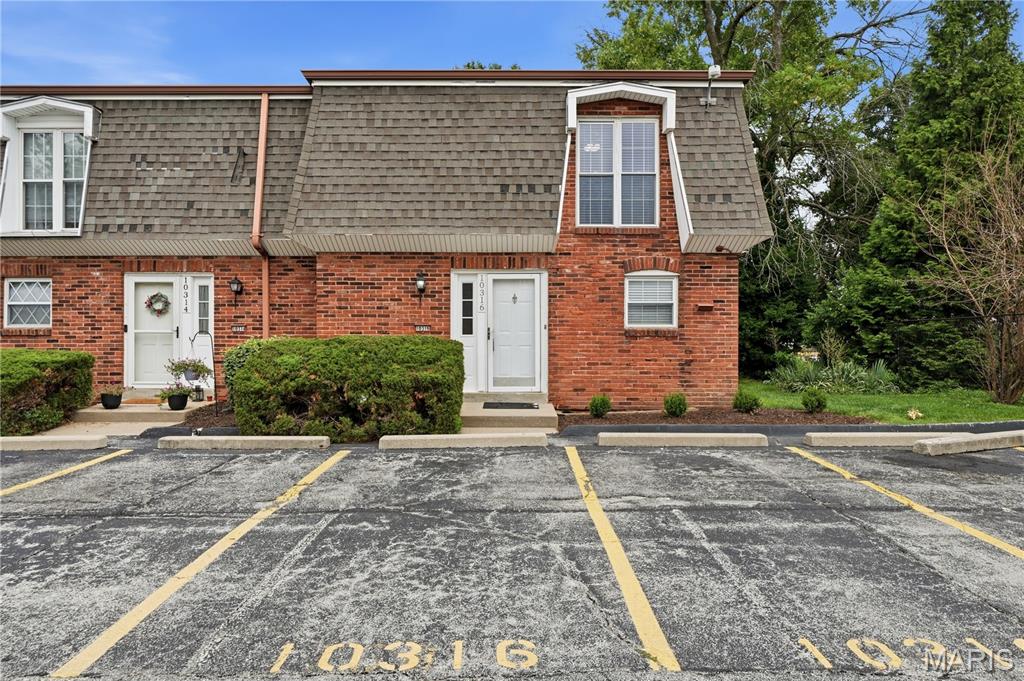 Welcome home to this beautiful, move-in-ready, end unit townhome located in the sought-after Pattonville School District! Offering three bedrooms upstairs and a thoughtfully designed layout, this home combines comfort, convenience, and low-maintenance living.

Upstairs the spacious primary bedroom features hardwood floors and a walk-in closet. Two additional bedrooms provide flexibility for family, guests, or a home office and the full bathroom completes the upstairs level.

The main floor has the second full bathroom, a generous open living room and dining area with a gas fireplace, and the kitchen comes complete with all appliances included, making your move even easier. Step outside to your private fenced backyard, a low-maintenance outdoor retreat featuring established garden beds and plenty of space for enjoying your morning coffee, entertaining or relaxing in the evenings. Beyond the fence, a grassy common area provides additional green space and a peaceful, open backdrop to your outdoor living area.

The freshly updated lower level showcases new flooring and fresh paint, creating versatile living space perfect for a family room, recreation area, home gym, or workspace. The half bathroom, laundry area, and additional storage space provide added convenience and functionality, making it easy to keep everyday living organized while maximizing the home's usable space.

Additional highlights include two designated parking spaces assigned to the unit and a major exterior improvement already underway, with the HOA replacing roofs throughout the entire association beginning June 2026.

With numerous updates throughout, this charming townhome offers exceptional value in a desirable location. Schedule your showing today and discover all that 10316 Corbeil Dr has to offer!