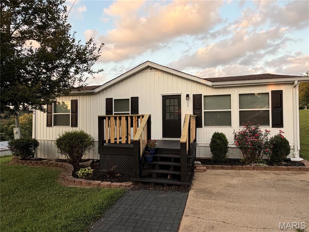Step into this adorable, freshly updated manufactured home and fall in love at first sight!  Nestled and waiting for its new family, this bright and cheerful 3-bedroom, 2-full bath beauty feels like a warm hug the moment you walk through the door.  The spacious open concept layout is perfect for everyday living and entertaining.  The kitchen flows seamlessly into the living room making it easy to whip up pancakes while chatting with your family or hosting.