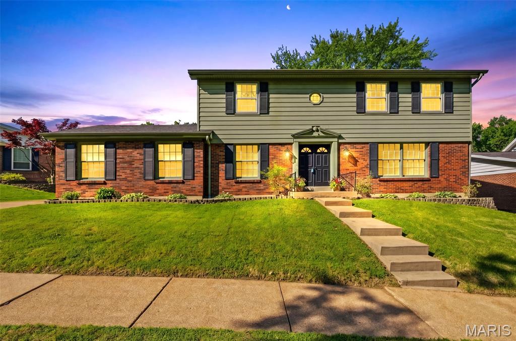 Welcome to this beautifully maintained 4-bedroom, 2.5-bath two-story home located in the highly desirable Laurel Oaks Estates and situated within the award-winning Lindbergh Schools! Known for its strong sense of community, tree-lined streets, and abundance of families, this sought-after neighborhood offers the perfect blend of comfort, convenience, and charm.
Step inside to discover a spacious and inviting floor plan designed for both everyday living and entertaining. The sun-filled living room showcases beautiful wood flooring and an abundance of natural light, creating a warm and welcoming atmosphere. A separate formal dining room with rich wood floors provides the perfect setting for holiday gatherings and dinner parties. The expansive family room features stunning wood floors, a cozy wood-burning fireplace, custom bookshelves, and a classic mantle, making it an ideal space to relax and unwind. Solid core doors throughout much of the home add quality craftsmanship and timeless appeal.
The functional kitchen offers both style and practicality with gorgeous navy cabinetry, a gas cooktop, pantry, peninsula, and a bright breakfast area perfect for casual dining. A conveniently located half bath completes the main level.
Upstairs, the oversized primary suite serves as a true retreat with a ceiling fan and an incredible updated ensuite bathroom featuring a beautifully tiled shower with glass enclosure and dual adult-height vanities. Bedrooms two, three, and four each offer ample space, plush carpeting, and ceiling fans for added comfort. An additional beautifully updated full bathroom upstairs includes an adult-height vanity and stylish subway tile finishes.
Outside, this home continues to impress with excellent curb appeal, a massive backyard ideal for entertaining or play, a covered patio perfect for outdoor gatherings, and a rear-entry garage for added convenience and functionality. An updated electrical panel provides added peace of mind and modern reliability.
Move-in ready and packed with updates, this exceptional home offers the space, location, and community buyers are searching for. Conveniently located near shopping, dining, parks, and easy access to all major highways, this is an incredible opportunity to own a spacious home in one of the area’s most desirable neighborhoods and school districts!