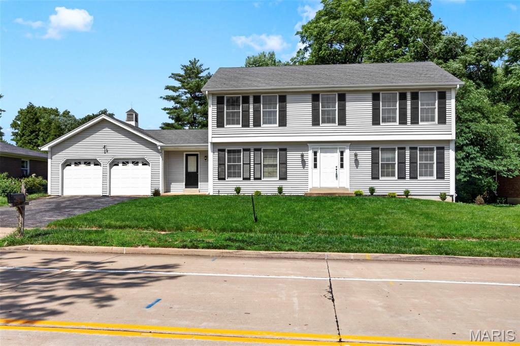 Welcome to this charming Chesterfield home where your story begins today! It feels like HOME from the moment you step inside to this immaculate and well maintained one owner, 4 bedroom, 2.5 bath spacious 2 Story. Main floor boasts open entry foyer, living and dining rooms, spacious family room with gorgeous hardwood flooring, Wood Burning brick fireplace with built in surrounds on each side. . Open wet bar area off the family room, half bath, large breakfast room and kitchen w/bay window, planning desk, pantry, wall oven/microwave combo, Solid Surface countertop, hardwood flooring, main floor laundry with cabinets and closet space located off the 2 car attached garage. Second floor includes a spacious primary suite w/large walk-in closet, updated primary bath w/seperate his and hers vanities.. The secondary bedrooms are very roomy. Finished lower level with large family room for entertaining, craft room, sleeping area is complete with a Full Bath. All located in the desirable Parkway Central School District! SCHEDULE YOUR SHOWING TODAY!