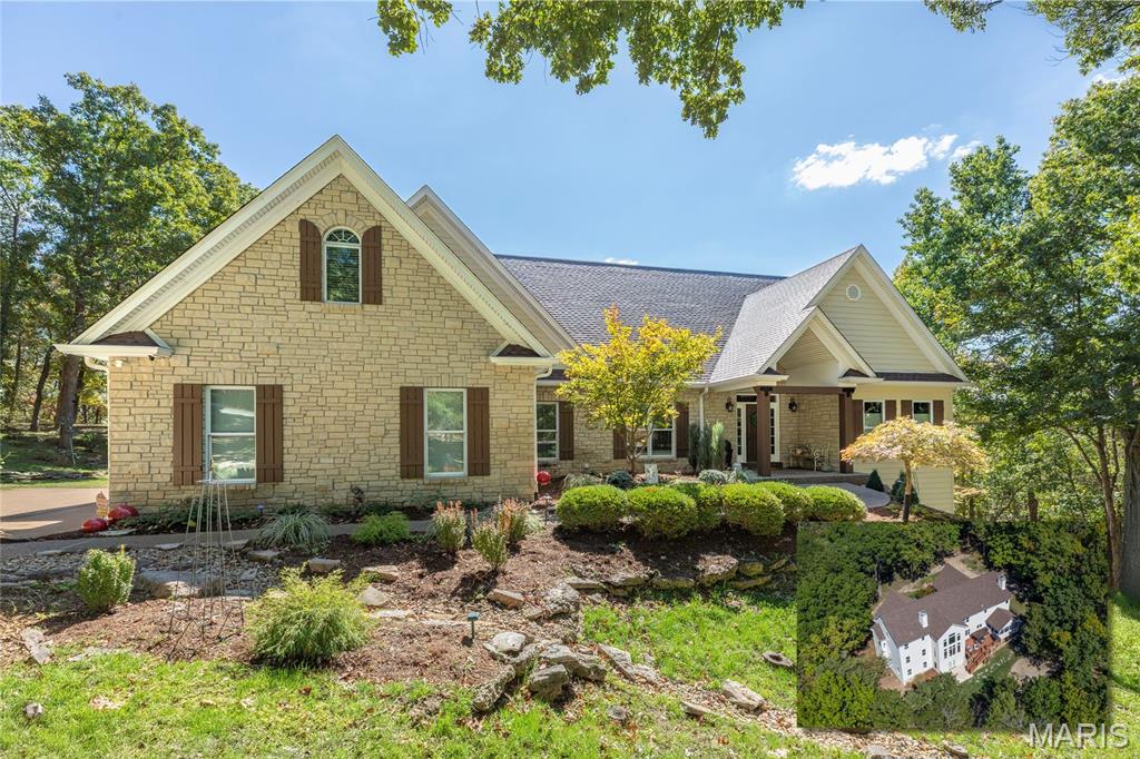 Back on Market - No Fault of Seller - Buyer Couldn't Perform on Home Sale Contingency. Exceptional 1.5-Story Estate on 5.27 Wooded Acres in Wildwood, set on a private, dead-end street and surrounded by serene wooded beauty. This extraordinary 5-bedroom, 5-bath residence offers over 5,400 square feet of refined living space, including a professionally finished walk-out lower level. Completely updated inside and out in 2024, this home blends timeless elegance with modern luxury and is truly move-in ready. From the moment you enter, soaring ceilings and a dramatic two-story wall of windows fill the great room with natural light and frame the peaceful outdoor setting. A beautiful stone fireplace, rich hardwood floors, and custom wood beams create a warm yet sophisticated atmosphere. The open main level is designed for both everyday living and elevated entertainment, featuring a private den or office and seamless flow throughout. At the heart of the home is a gourmet kitchen with custom cabinetry, quartz countertops, 10-foot center island, coffee bar, and a custom walk-in pantry with cabinetry and workspace. Top-of-the-line Bosch stainless appliances include a 6-burner gas cooktop with handcrafted wood hood. The kitchen opens to a breakfast room with Butler’s pantry and wine fridge and continues into the hearth room with a second stone fireplace and access to the screened-in porch, creating an ideal space for year-round gatherings. The main-floor primary suite, completed in 2024, is a true retreat with a large custom walk-in closet by St. Louis Closet Company and a spa-like bath featuring a soaking tub, multi-head walk-in shower with bench, custom double vanity, built-in makeup area, and heated floors. A beautifully designed laundry room with custom cabinetry, quartz counters, and deep stainless sink, along with a stylish powder room, complete the main level. Upstairs, you’ll find three spacious bedrooms, including one ensuite, a Jack-and-Jill bath, and an impressive bonus room that serves as a fifth legal bedroom or flexible living space. Dual staircases and a Juliet balcony add architectural interest and flow. The professionally finished walk-out lower level offers 9-foot ceilings, a large recreation area with multiple seating zones, a custom wet bar, fitness space, an updated half bath, and multiple generous unfinished storage areas. Additional highlights include a new roof in 2024, Newer Hardie cement board siding, dual-zoned high-efficiency HVAC with Wi-Fi thermostats, a 20kW whole-house gas generator, outdoor lighting, security system with camera surveillance, aggregate front porch and walkway, professional landscaping, fenced backyard, and an oversized 3-car side-entry garage with epoxy floors. A new 14’ x 15’ custom shed garage (2025) with electric provides ideal storage for ATVs, tools, or hobbies. Relax on the screened-in porch, expansive upper deck or lower patio and enjoy the peaceful, private setting. This remarkable property is perfect for family gatherings, entertaining friends, and everyday living surrounded by nature. Ideally located near shopping, dining, county parks, and major highways, this home offers the rare combination of privacy, luxury, and convenience.