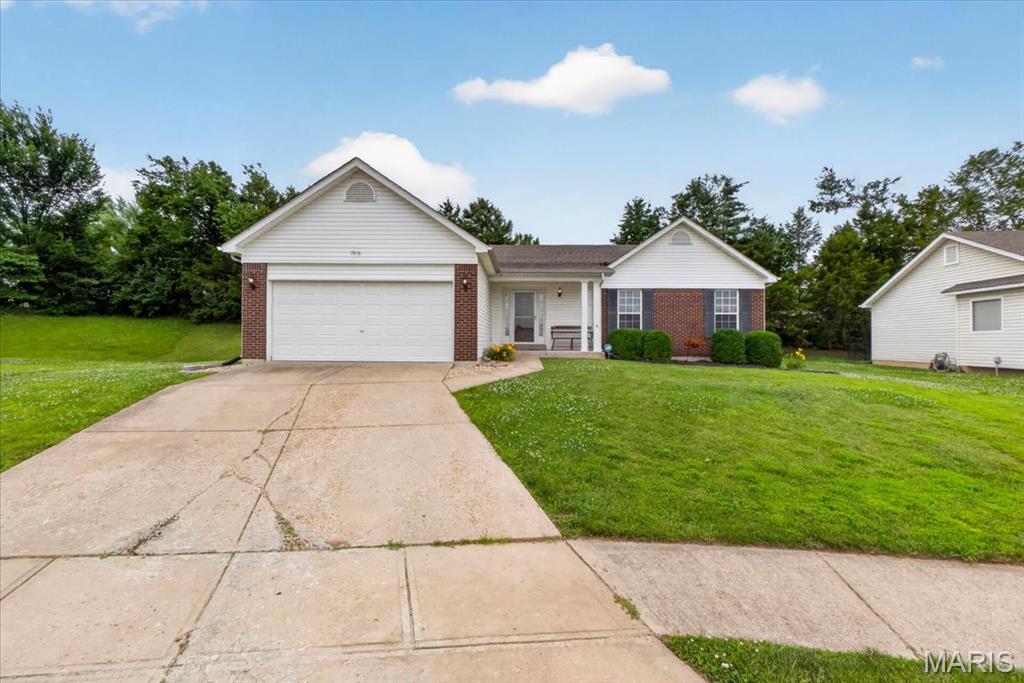 Welcome home to this beautifully updated and open floor plan ranch home in the highly desirable North Point Highschool District! From the moment you step inside, you'll appreciate the bright, open floor plan and soaring vaulted ceilings that extend through the great room, kitchen, and primary suite. This move-in-ready home features an updated kitchen with stainless steel appliances, updated countertops, and a convenient breakfast bar—perfect for everyday living and entertaining. The spacious great room serves as the heart of the home, showcasing a cozy wood-burning fireplace and ample amounts of natural light. Step outside to enjoy the tree-lined backyard featuring a large patio, creating the ideal space for outdoor gatherings, summer barbecues, or simply relaxing after a long day. The primary suite offers a private retreat with vaulted ceilings and an en-suite bath featuring a large vanity, soaking tub, and separate shower. The partially finished lower level adds valuable living space with a full bathroom, sleeping area/bonus room which could serve as a workout room, office, sleeping area, or game room. Additional highlights include main-floor laundry, a 2-year-old roof, and a convenient location close to shopping, dining, parks, and major commuter routes. Don't miss your opportunity to make it yours!