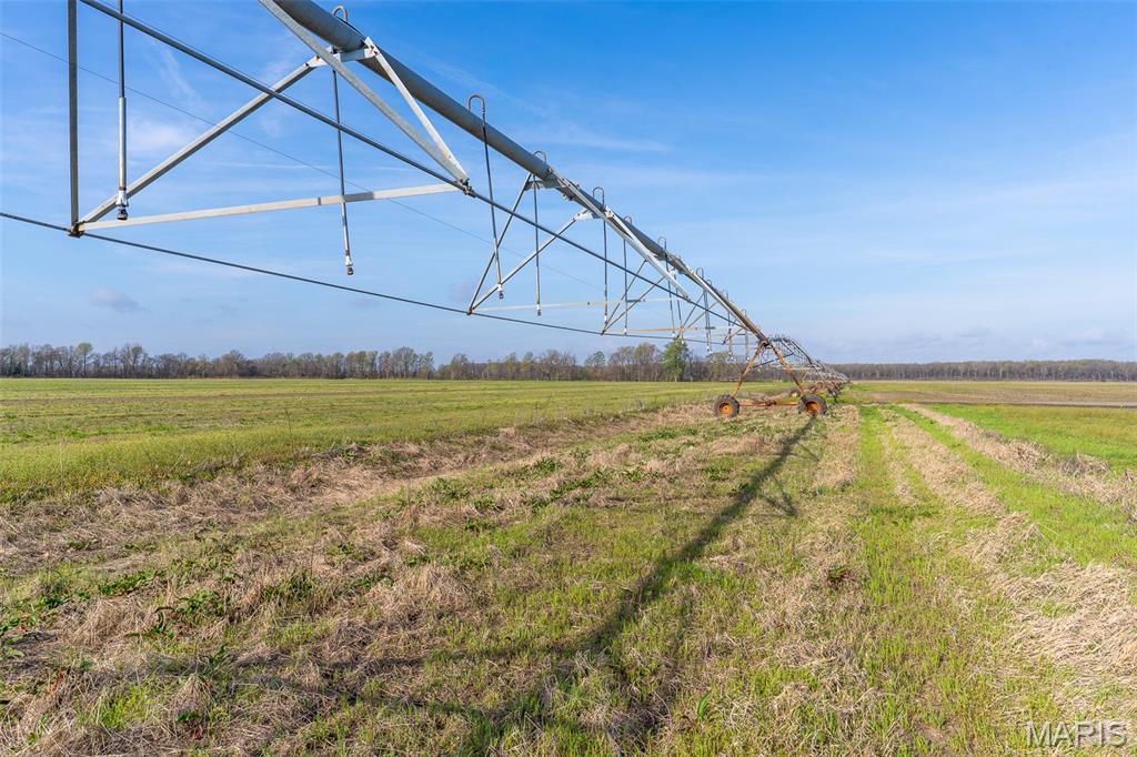 This productive row crop farm, 460+/- acres just east of East Prairie in Mississippi County Missouri, represents a high-quality agricultural asset with excellent dual-purpose utility. The farm is fully equipped for consistent production, with one half-mile center pivot serviced by its own high capacity well and a 6 cylinder John Deere diesel power unit, ensuring water and yield stability regardless of seasonal rainfall.  Its location near Ten Mile Pond Conservation Area makes it a very desirable spot for migrating waterfowl.  Year after year this farm has excellent yield potential as well as outstanding hunting opportunities.    
There are 4 additional farms available for purchase ranging from 100 acres to 460 acres totaling an additional 990 acres.