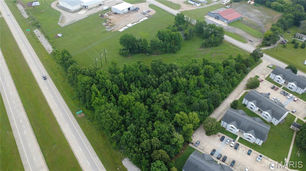 Exceptional 2-acre development opportunity in a prime high-visibility location on Highway 67 South with future Interstate 57 frontage. Featuring direct highway frontage and additional access from the East Outer Road, this property offers outstanding exposure and accessibility for a variety of development possibilities. Ideal for multifamily housing, retail, office or mixed-use development. Utilities including electric, water, and sewer are available, making this a ready-to-develop site in one of the area's most strategic growth corridors. Take advantage of the increasing traffic counts and future interstate connectivity that make this property a premier investment opportunity.