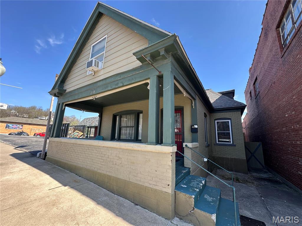Just steps from Hannibal's historic district this property could be your next investment opportunity. Airbnb, VRBO, the location begs for the opportunity of a short term rental, or maybe you are looking to relocate to the downtown area where you can walk Main St. and be part of the action. This 5 bedroom bungalow features 2 bedrooms and 1 full bathroom on the main level, kitchen, butlers pantry, separate dining room and living room all on the main level. Upstairs there are 3 bedrooms, and a 1/2 bathroom. Laundry is in the basement, there is a shared deck in the back.