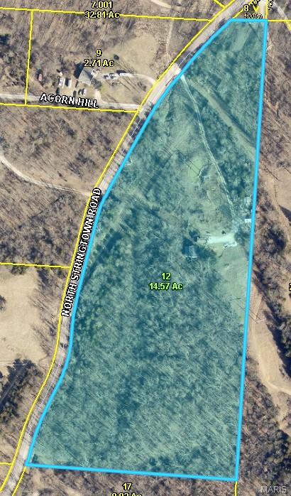 This lot is tucked within a peaceful, wooded setting.  This 3.8 +/- acre parcel offers the perfect canvas to bring your vision to life. Towering trees provide natural beauty, privacy, and a serene setting, while the generous size gives you flexibility for a custom home, outbuildings, or simply room to spread out. Additional acreage is available to add to this 3.8 acre lot. 

Whether you're dreaming of a quiet retreat or a place to build your forever home, this property is a true blank slate—ready for your plans and personal touch. Enjoy the best of both worlds with a rural feel and tranquil surroundings, all while being just a short drive from town, shopping, and everyday conveniences.

Protective covenants and restrictions will be established prior to closing, helping preserve the character and long-term appeal of the area. Please note the road access is currently a bit rough, but improvements are planned in the near future, making access even more convenient.

Address is to get to the property only - lot is located to the Southeast of the property and does not include any buildings or structures.
