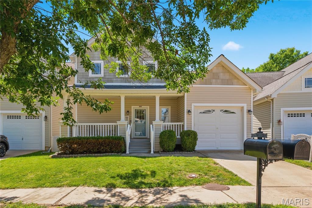 3 Bedroom, 2.5 Bath, 1.5 Story home with a main floor Primary Bedroom Suite in the sought after Enclave at Montclair neighborhood! This spacious home offers 1,848 sq ft of open, smart living space and a full basement.  The exterior is charming with vinyl and shake siding, a large covered front porch with a composite deck and vinyl handrails, coach lights, architectural shingles and a one car garage with an insulated garage door. Features include 9 foot ceilings throughout the main floor, wood flooring in the Entry, Great Room, Breakfast Room and Kitchen, main floor laundry, main floor Powder Room, Kitchen with seating bar, 42 inch cabinets with hardware, smooth top electric range, microwave and pantry. The large main floor Primary Suite offers a bay window, walk in closet, luxury bath with soaking tub, separate shower, double bowl vanity and linen closet. Upstairs there is a spacious Loft, guest bath, and two Bedrooms, both with walk in closets. The backyard is level, fenced and has a patio perfect for your outdoor enjoyment. The Primary Bedroom Suite has been recently painted and the water heater is newer. Enjoy easy access to Highways I-70, 94, 364, Lambert International airport, shopping and restaurants on Historic Main Street in St. Charles, the popular Streets of St. Charles Entertainment District, the Katy Trail, beautiful parks and more. The mail is delivered to the curb at your driveway.  Great home, amazing location, so much to love!