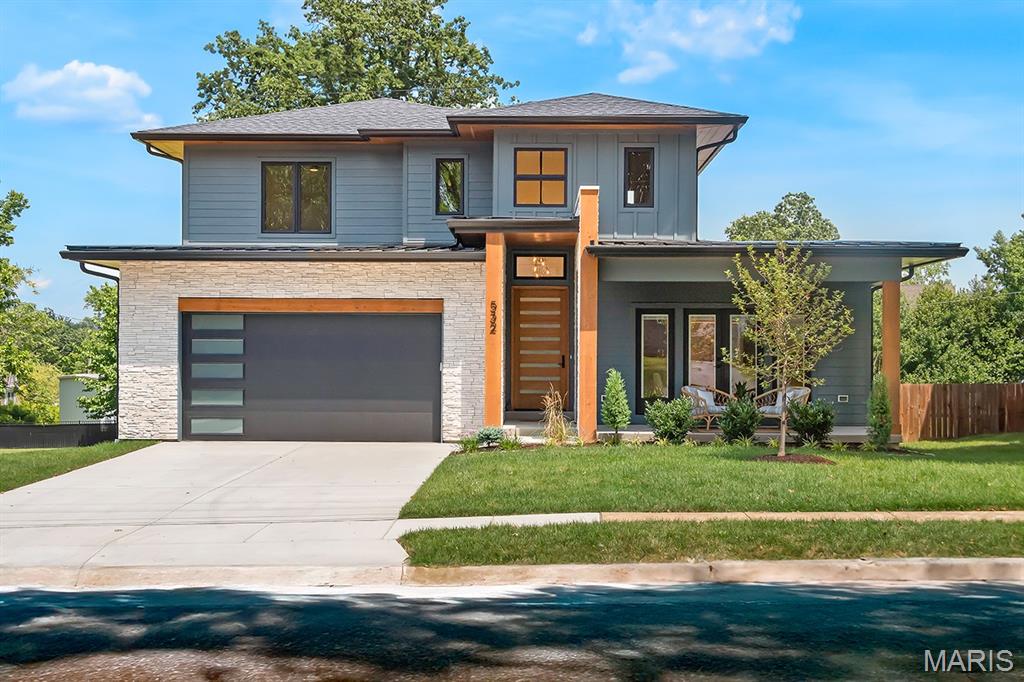 A MUST SEE! 532 South Fillmore is not your typical new build. Offering all of the space & modern conveniences you expect, it goes a step further, pushing a fresh, clean style. This 5-bedroom, 4.5-bath new build by Molner Homes offers EXCEPTIONAL craftsmanship. From sleek, clean lines to warm, refined wood finishes, thoughtful design is evident in every detail. The incredible chef’s kitchen features a large center island, quartz countertops, custom cabinetry, 6-burner gas range, & a spacious walk-in pantry. The kitchen flows seamlessly into the great room, where 12-foot ceilings, gas fireplace, & access to a large covered outdoor living area make it perfect for entertaining. The main-floor primary suite offers a private retreat w/ dual walk-in closets & a spa-like en suite bath complete w a soaking tub, walk-in shower, & dual vanities. Upstairs, bedrooms 2, 3, and 4 each have walk-in closets. One includes a private en suite, while the other two share a spacious bath. The finished lower level adds nearly 1,500 sq ft of finished living space, including a 5th bedroom, full bath, & convenient kitchenette—ideal for convenience or entertaining. Additional highlights include main-floor laundry/mudroom w/ custom built-ins, rich hardwood floors, Hardie board siding, zoned HVAC, attached 2-car garage, & huge, flat backyard perfect for a pool. Just blocks from the heart of Kirkwood including farmers market, shops, & restaurants, this home is made to impress.