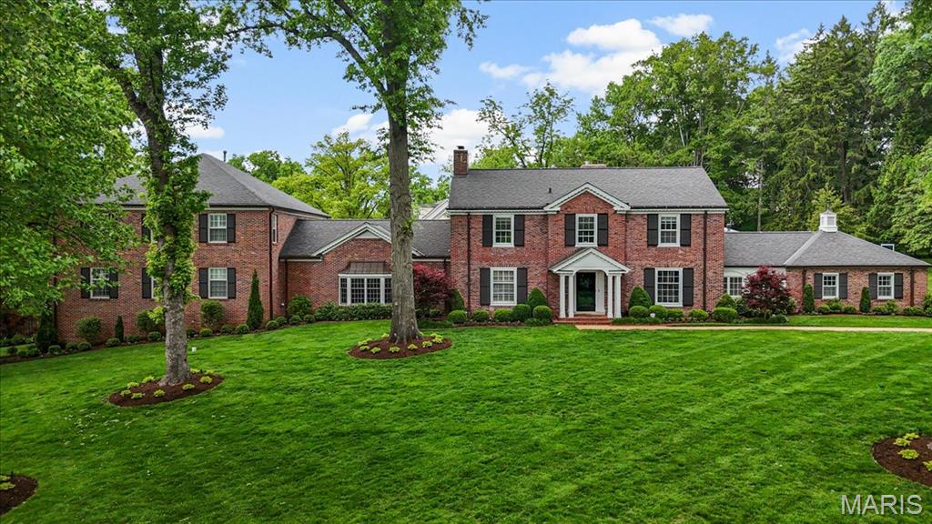 A rare offering of scale, privacy, and luxury—this exceptional Ladue estate delivers a true resort-style lifestyle both inside and out. Extraordinary, fully reimagined estate set on almost 1.5 private acres in one of Ladue’s most prestigious settings. Showcasing 7 bedrooms and 10+ baths, this exceptional residence masterfully blends timeless traditional design with elevated, updated modern living. Thoughtfully curated with extensive high-end renovations, the home offers a seamless flow of refined living and entertaining spaces. A stunning chef’s kitchen—complete with premium appliances, bespoke cabinetry, and an expansive center island—anchors the main level and opens effortlessly to both formal and informal gathering areas. Two main-level suites provide ideal accommodations for guests or multi-generational living. Designed with lifestyle in mind, the home features a sophisticated collection of amenities, including a media room, billiards area, pub-style lounge, and a private fitness space. A separate guest apartment or pool house offers additional flexibility and privacy. The outdoor setting is equally impressive, creating a true resort-style experience with a newly constructed pool, expansive patios, and beautifully landscaped grounds that provide both scale and seclusion. Enhanced by refined finishes, custom millwork, designer lighting, and significant system updates—including a whole-home generator—this turnkey residence represents a rare opportunity in a premier location.