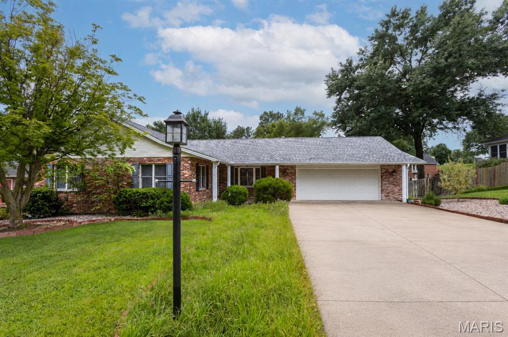 Priced Under Appraisal! This custom built ranch-style home is a great opportunity to buy in Randol Farms, one of Cape's most desired neighborhoods. Amazing space, many built-in features, and awesome closets and storage throughout!  The living room/dining room combination has new paint, and brand new carpet and pad from Holloway. The main level family room has a gas fireplace, a built in bookshelf/curio area, and a bay window facing the front of the home. The kitchen offers an abundance of custom cabinetry, custom lighting, and counter space. All appliances and the washer and dryer stay. The electric range/oven and microwave are stainless. A large walk-in pantry is adjacent to the kitchen, and opposite the convenient main-level laundry. The primary bedroom suite is a true sanctuary that will accommodate your king-sized bed and furniture. The primary bathroom features a make-up vanity counter, and two sets of built in storage units. Then you walk into an amazing floor to ceiling closet space that is sure to impress. The two additional bedrooms also have extra closet space. The second full bath also has extra built-in wall storage. The lower level is designed for relaxation by the fireplace or fun- with a wet bar and mini frig, space for a gym area, a pool table, library bookcases, a theatre room, or homeschool classroom. The sleeping room, that many would use as a fourth bedroom, could be a large office, or playroom with closets on two walls. The third bath in the basement also has an extra closet and built-ins. The John Deere room with an extra walk-out door exit has a utility sink, a workbench, and a large wall of storage shelves. Don't miss the 1/2 bath off the main level garage, the sunroom porch, garden area, lampposts on each side of the driveway, and many more custom features. Enjoy peace of mind with a new roof in April 2025, and a 22KW Whole House GENERAC Standby Natural Gas Generator! Schedule your appointment today to see all that 2419 Horse Shoe Ridge has to offer!