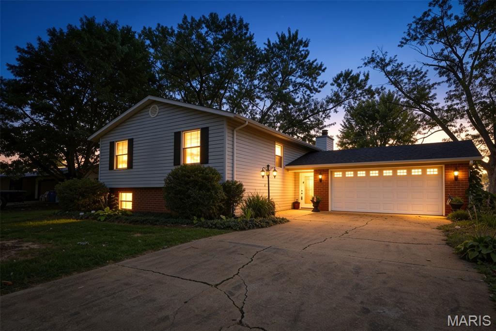 Professional Photos Coming Soon. 
Welcome to 550 Oka Street in Farmington, Missouri. This well-maintained split-entry home offers space, comfort, and a fantastic location just minutes from downtown Farmington, shopping, dining, schools, and everyday conveniences. Recent improvements include a brand-new roof, fresh interior paint on the upper level, and new carpeting in two bedrooms, making this home ready for its next chapter.

The main level features 1,208 square feet of living space with beautiful hardwood floors, a warm and inviting living room with a wood-burning fireplace, and a functional layout designed for everyday living. The upper level includes three bedrooms and two full bathrooms, with hardwood flooring extending into the primary bedroom.

The finished lower level adds approximately 1,064 square feet and offers a spacious family room, third full bathroom, laundry area, and a versatile bonus room that could serve as a home office, hobby room, workout space, or potential fourth bedroom.

Outside, you'll appreciate the mature trees, established landscaping, and spacious backyard. Enjoy relaxing or entertaining on the elevated deck with stairs leading down to the patio area below, creating multiple outdoor living spaces to enjoy throughout the year.

An attached two-car garage provides convenience and additional storage. The kitchen and bathrooms offer an opportunity for future personalization, allowing the next owner to add their own style while enjoying a home that is move-in ready and well cared for. Located on a desirable street in an established neighborhood, this home combines space, comfort, and value in one of Farmington's most convenient locations.