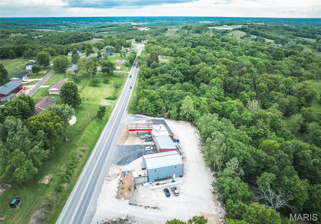 Excellent Income and Investment. This 10,700 sq ft Commercial building is comprised of 6 fully leased rental avenues generating a steady 6.0% ROI. The property offers strong income stability through a diverse tenant mix and is located in a high-visibility, easily accessible area. Tenant areas, including a Bar/Restaurant, Daycare, Hair Salon, and Antique store, have been excellently designed for ample use for each individual need. Two storage areas provide additional passive income making this an ideal hands-off investment opportunity. Located in Loose Creek, Mo in Osage County. Studio apartment rental potential.