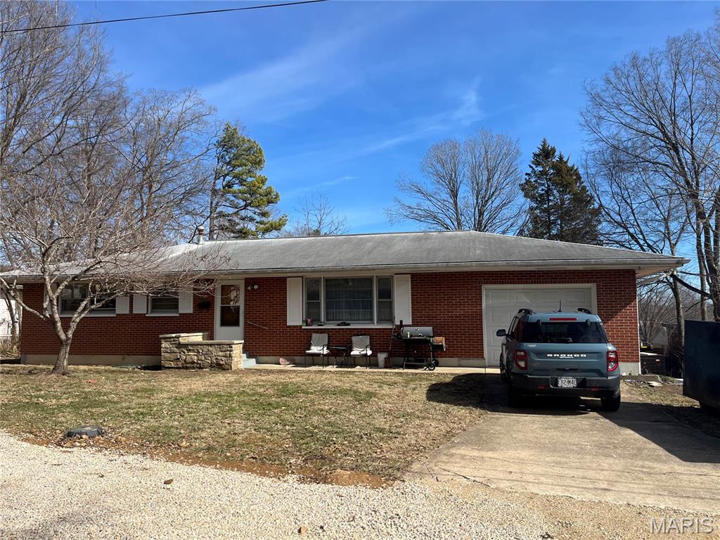 Full brick home on quiet street in Ironton.  This two bedroom, 1 bath home has nice oak floors, remodeled bath and kitchen with a screened porch off kitchen.  Bedrooms have sizable closets. The basement has a bedroom and bathroom that needs TLC but could make the 3rd bedroom. Home priced to be affordable for young family..