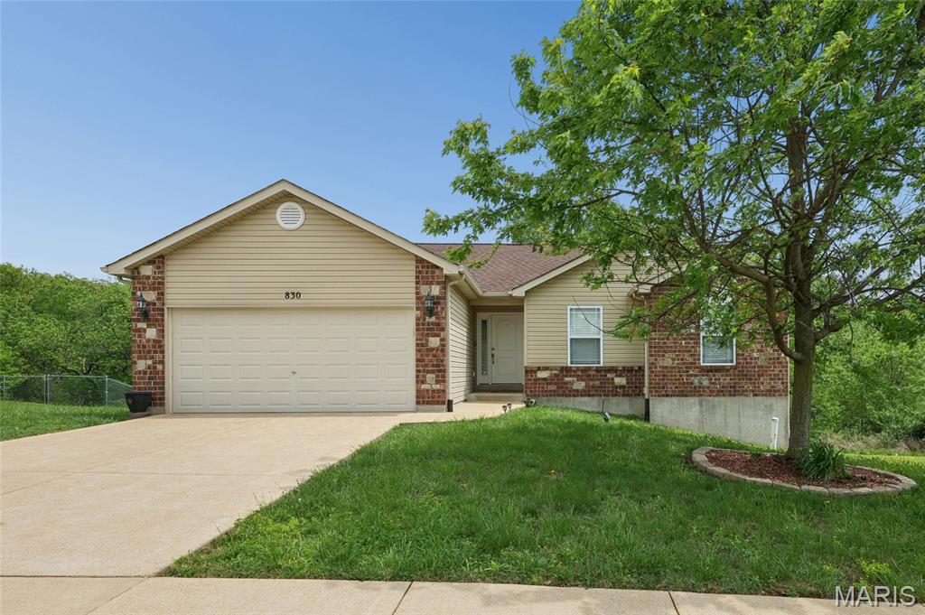 Hillsboro Schools!
Don’t miss this beautifully maintained, one-owner home located in the heart of Hillsboro, next to the high school. This move-in ready property offers numerous upgrades—why wait to build when you can enjoy comfort now?
The open-concept great room features a cozy gas fireplace, vaulted ceilings, and newer flooring, creating a warm and inviting space. The bright, open kitchen includes a breakfast bar, pantry, plenty of custom cabinets and patio door leading to a covered deck complete with electric, ceiling fan, lighting, and more perfect for relaxing or entertaining while enjoying the peaceful wooded view and added privacy.
The primary bedroom suite is generously sized and offers a walk-in closet. The ensuite bathroom features a garden tub, separate shower, and a large linen closet—everything you need conveniently located without leaving the suite. Two additional bedrooms are also nicely sized.
The unfinished lower level provides a blank canvas for future expansion and offers a walk-out with easy access to the patio and backyard. The large lot extends deep into the wooded area and has been partially cleared to include walking trails, offering a private outdoor retreat.
Hurry now and check "house hunting" off your summer to do list!